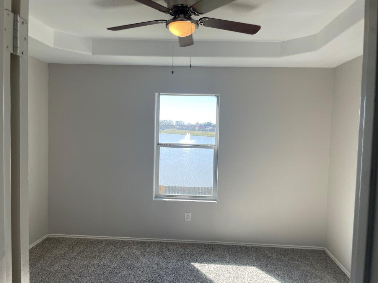12704 Rio Nueces Lane Rosharon, TX 77583 - Photo 22 of 41 an empty room with a window