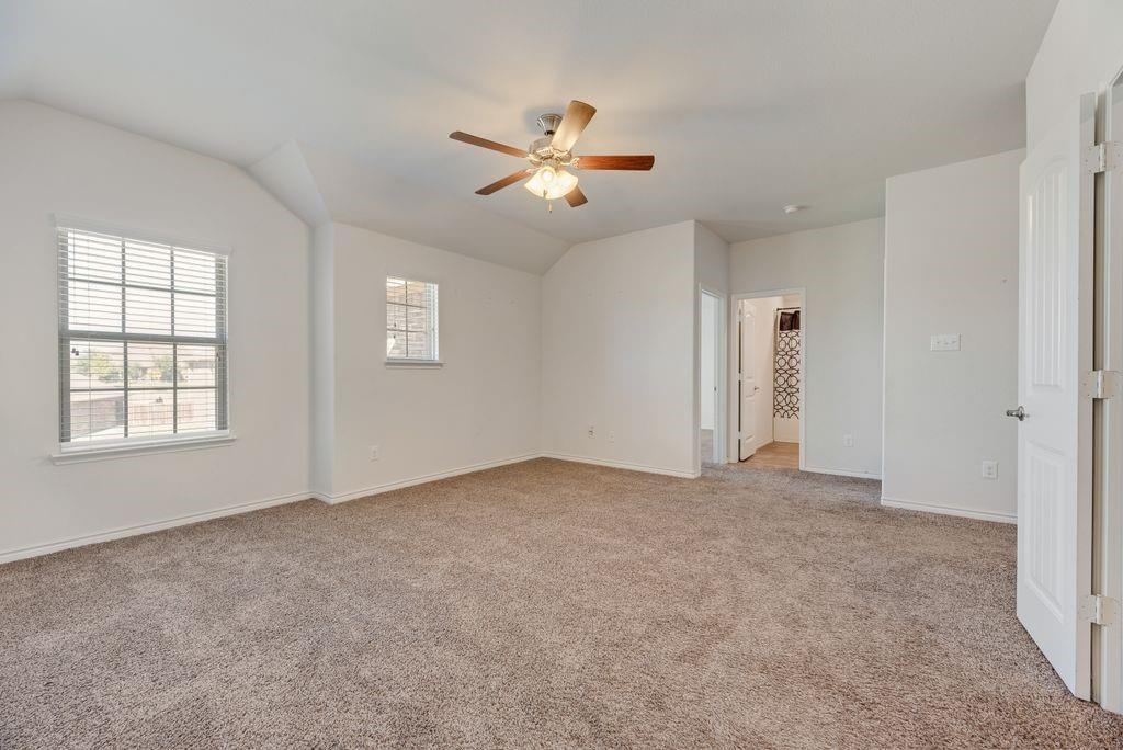 633 Bassett Hall Road Fate, TX 75189 - Photo 12 of 20 a view of an empty room with a window