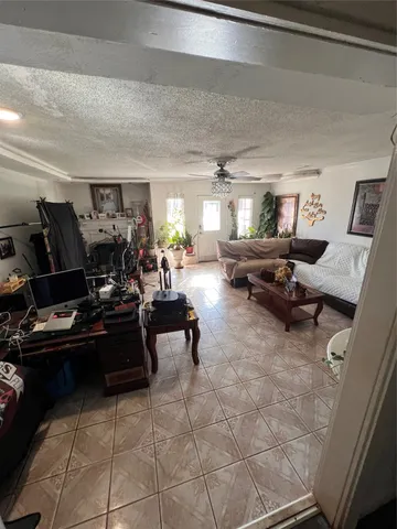 a living room with furniture and furniture
