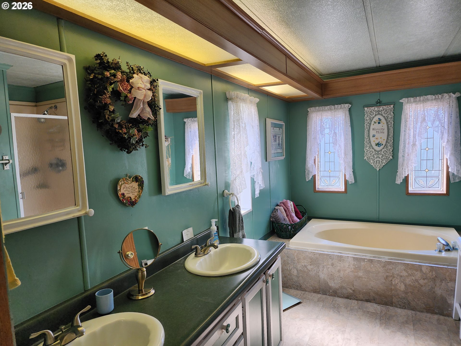 5422 Portland Road Northeast Salem, OR 97305 - Photo 11 of 14 a bathroom with a sink double vanity and a mirror