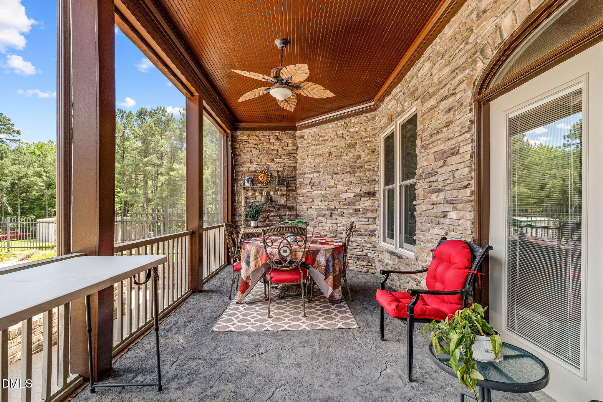10917 Jordan Road Raleigh, NC 27603 - Photo 42 of 58 a view of an outdoor sitting area with furniture and wooden floor