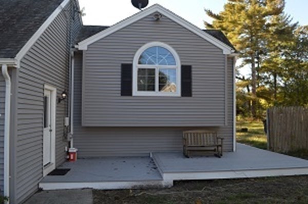 12 Summer Street Wareham, MA 02571 - Photo 3 of 24 a front view of a house with garden