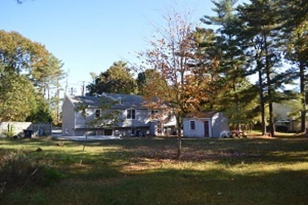 12 Summer Street Wareham, MA 02571 - Photo 5 of 24 a view of house with swimming pool and trees