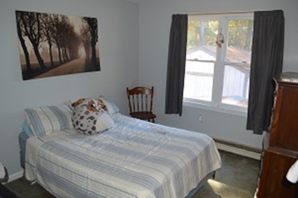 12 Summer Street Wareham, MA 02571 - Photo 9 of 24 a bedroom with a bed and a window