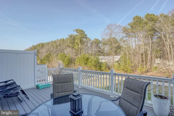a view of balcony with furniture