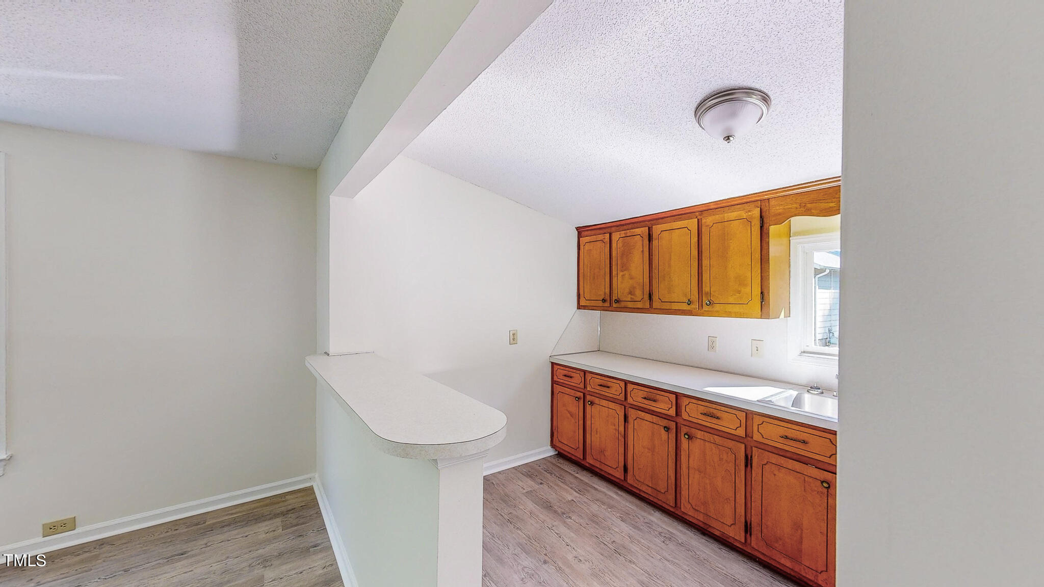 3906 Cole Mill Road Durham, NC 27712 - Photo 12 of 33 a bathroom with a sink a toilet and mirror