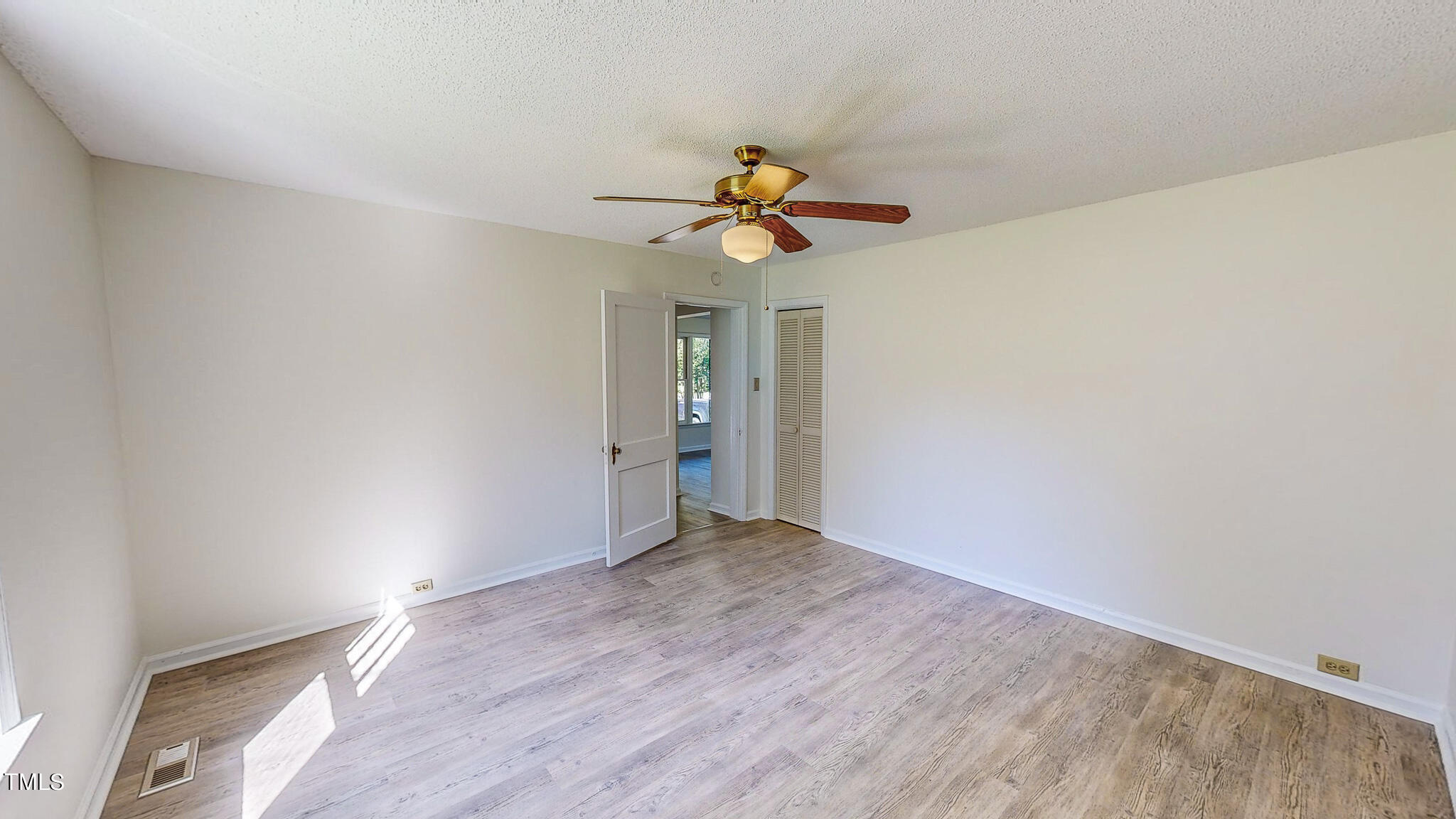 3906 Cole Mill Road Durham, NC 27712 - Photo 22 of 33 a view of a chandelier fan in a room
