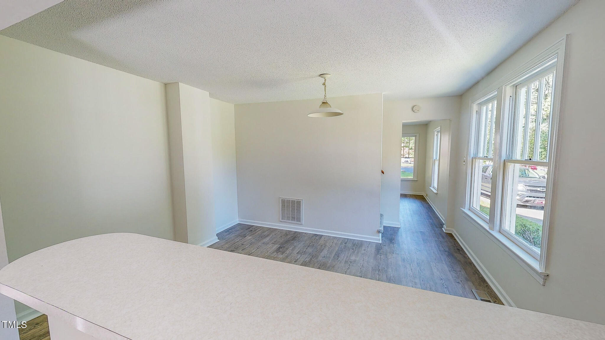 3906 Cole Mill Road Durham, NC 27712 - Photo 26 of 33 a bedroom with a bed and a large window