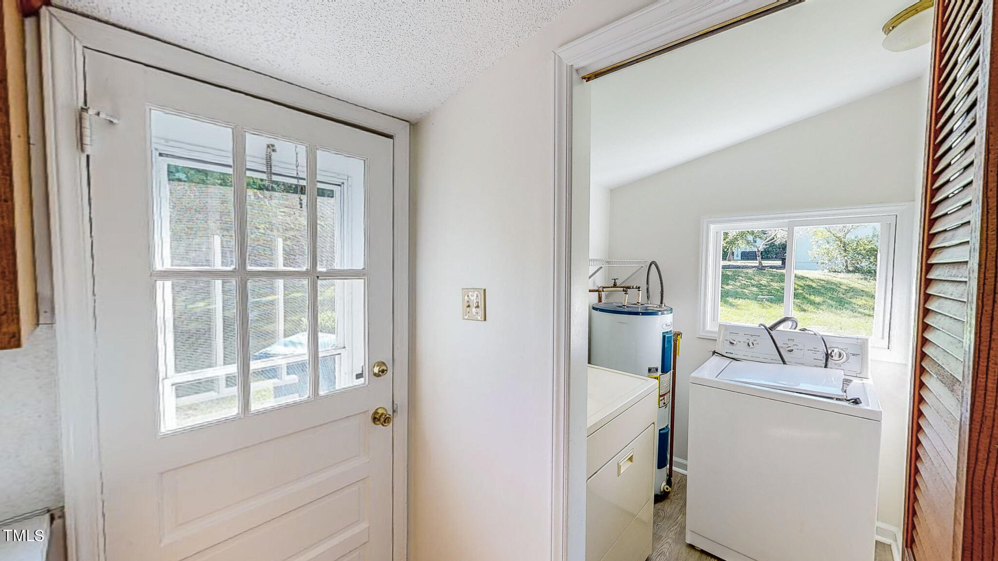 3906 Cole Mill Road Durham, NC 27712 - Photo 28 of 33 a room with a window and a bath tub