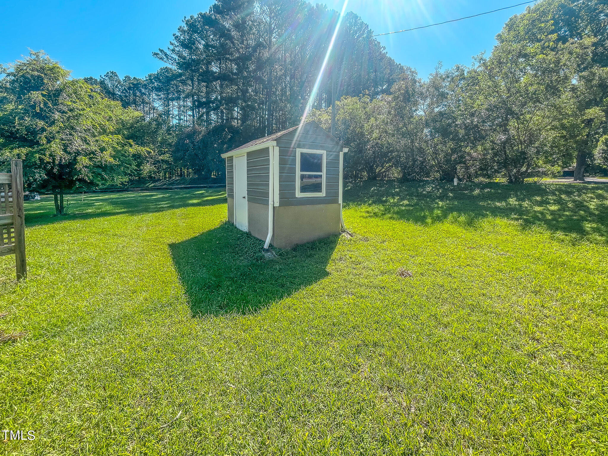 3906 Cole Mill Road Durham, NC 27712 - Photo 32 of 33 a view of a house with swimming pool and a yard