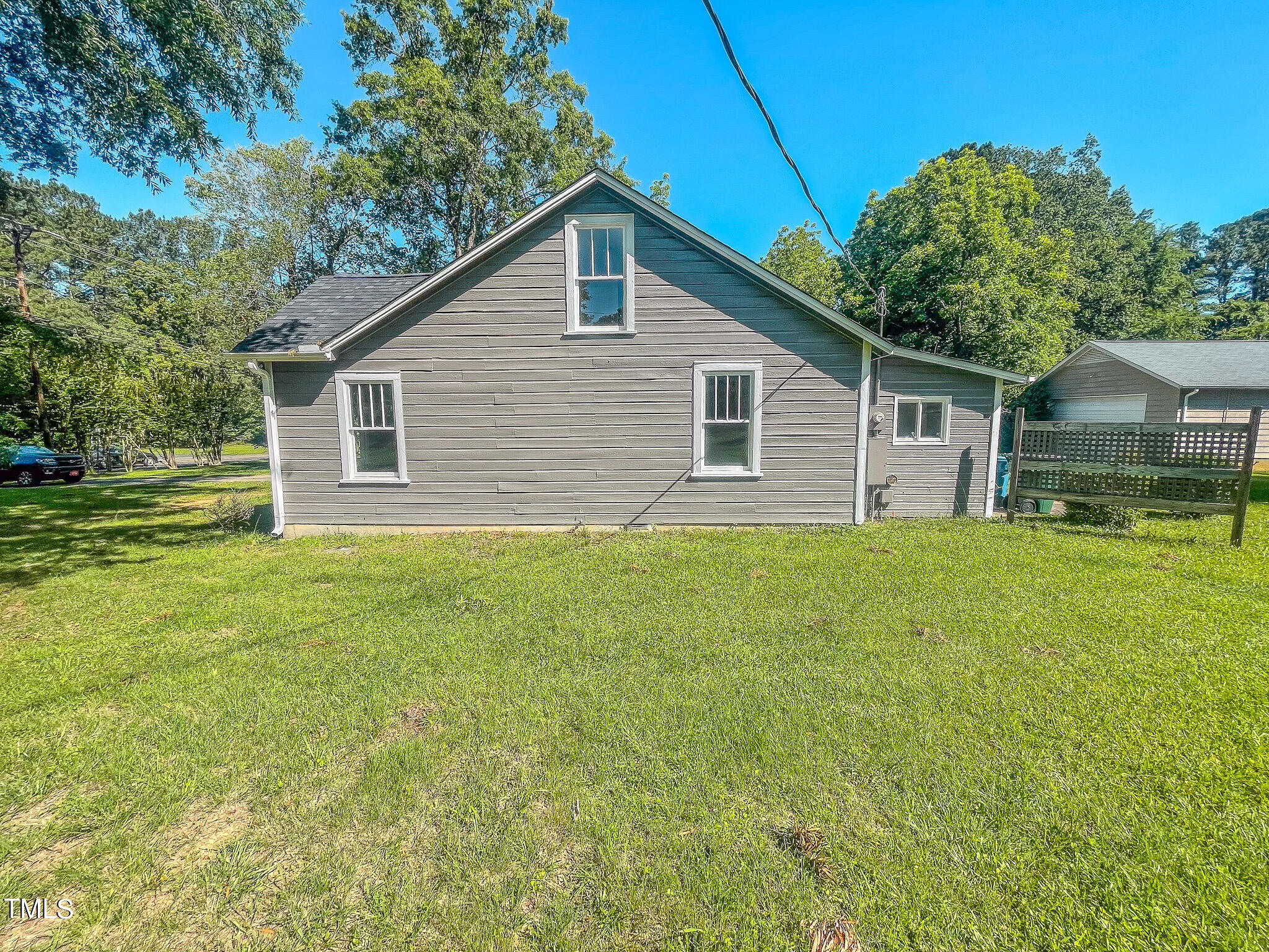3906 Cole Mill Road Durham, NC 27712 - Photo 33 of 33 a front view of house with yard and green space