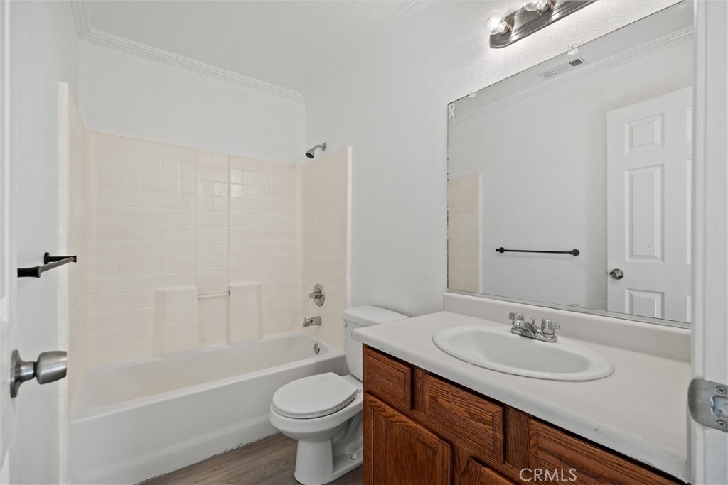 2067 Blossom Avenue Corning, CA 96021 - Photo 20 of 37 a bathroom with a sink and a mirror