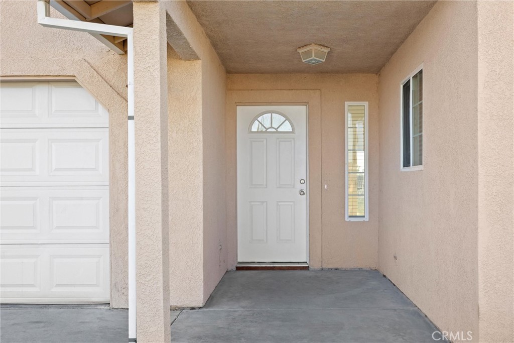 2067 Blossom Avenue Corning, CA 96021 - Photo 3 of 37 a view of an entryway with wooden floor