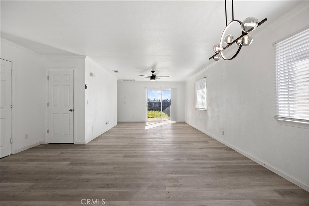 2067 Blossom Avenue Corning, CA 96021 - Photo 6 of 37 a view of empty room with wooden floor and fan