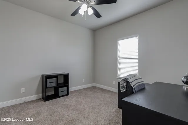 a room with furniture and a window