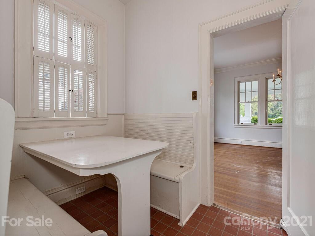 1600 Queens Road Charlotte, NC 28207 - Photo 13 of 30 a bathroom with a sink and a window