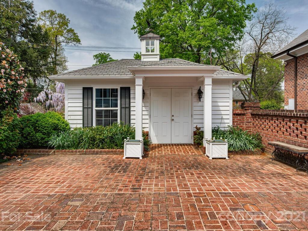 1600 Queens Road Charlotte, NC 28207 - Photo 21 of 30 a front view of a house with a yard