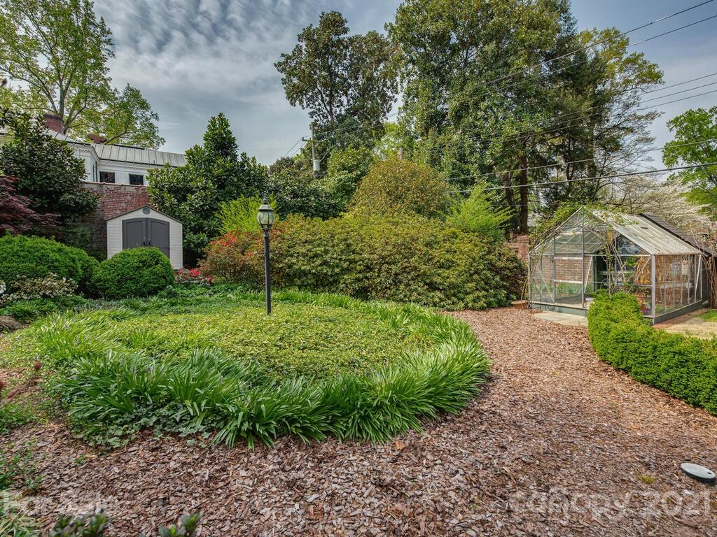 1600 Queens Road Charlotte, NC 28207 - Photo 24 of 30 a view of a front of house with a yard