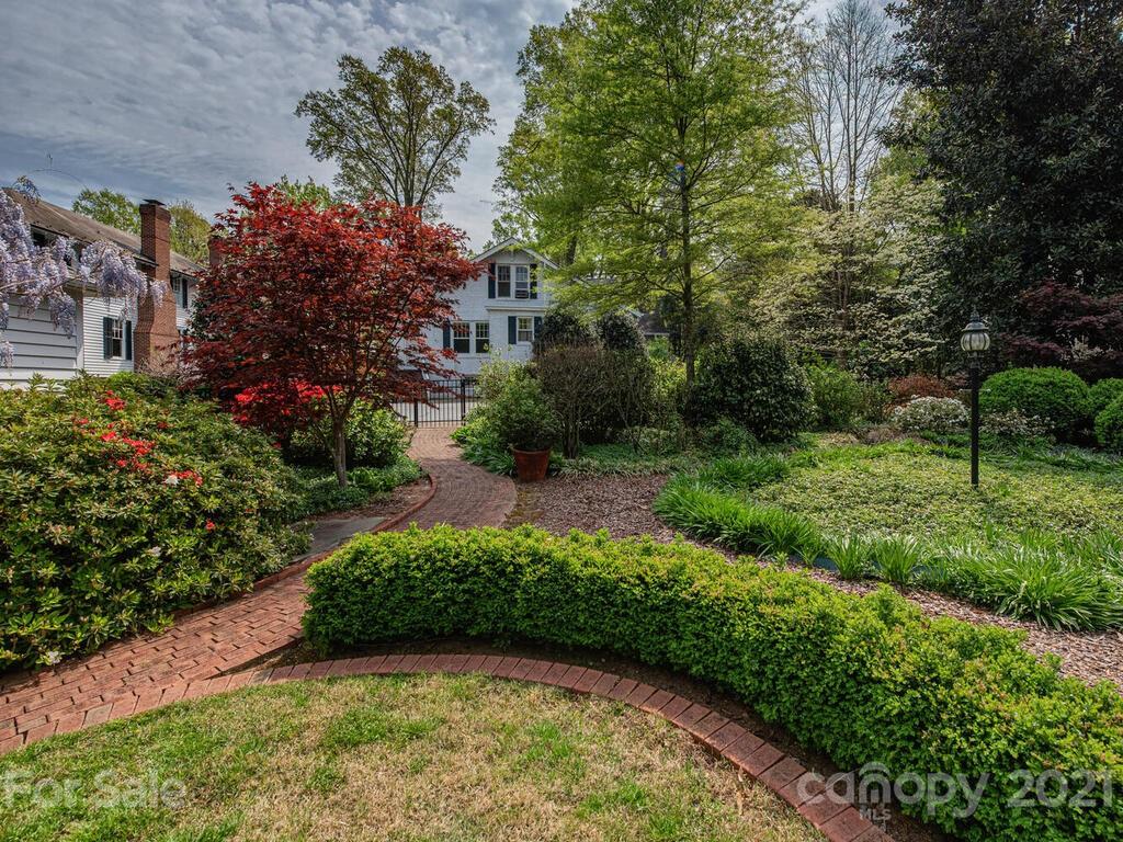 1600 Queens Road Charlotte, NC 28207 - Photo 25 of 30 a view of a garden with a pathway