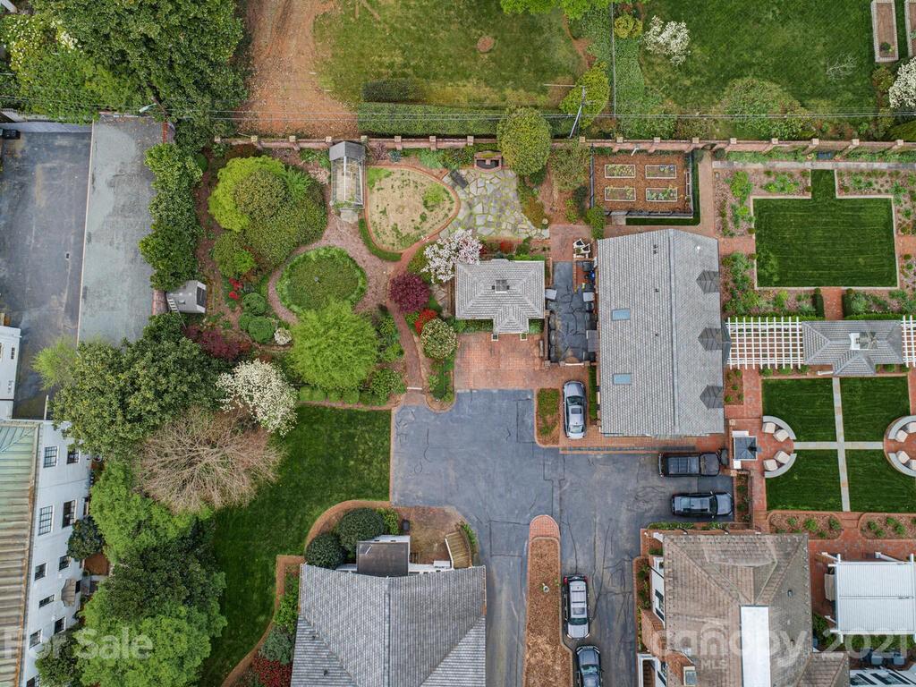 1600 Queens Road Charlotte, NC 28207 - Photo 27 of 30 an aerial view of residential house with outdoor space and parking