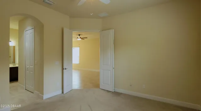 an empty room with windows