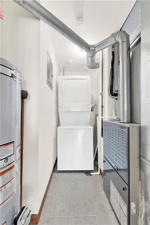 a utility room with cabinets