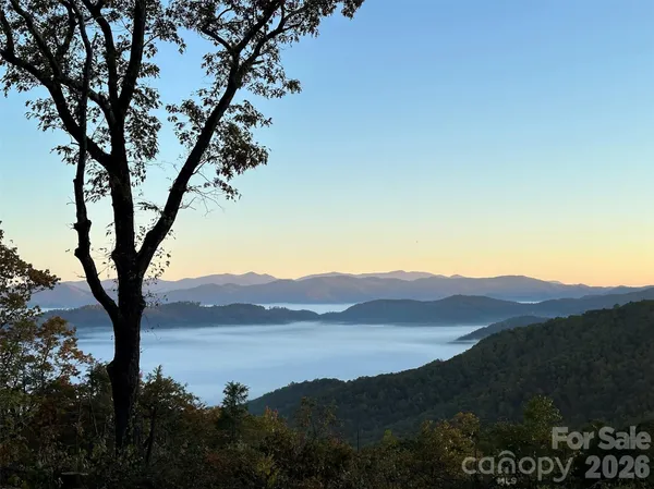 a view of lake and mountain