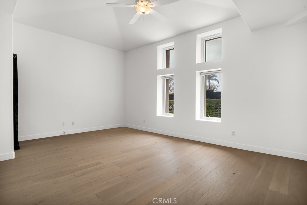 6435 Zumirez Drive, Unit 2 Malibu, CA 90265 - Photo 14 of 32 an empty room with windows