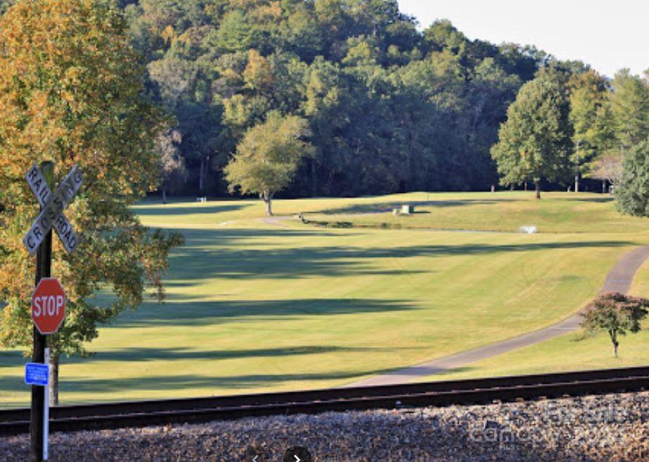8888 Reep Drive, Unit 2 Morganton, NC 28655 - Photo 11 of 26 a view of backyard with large trees