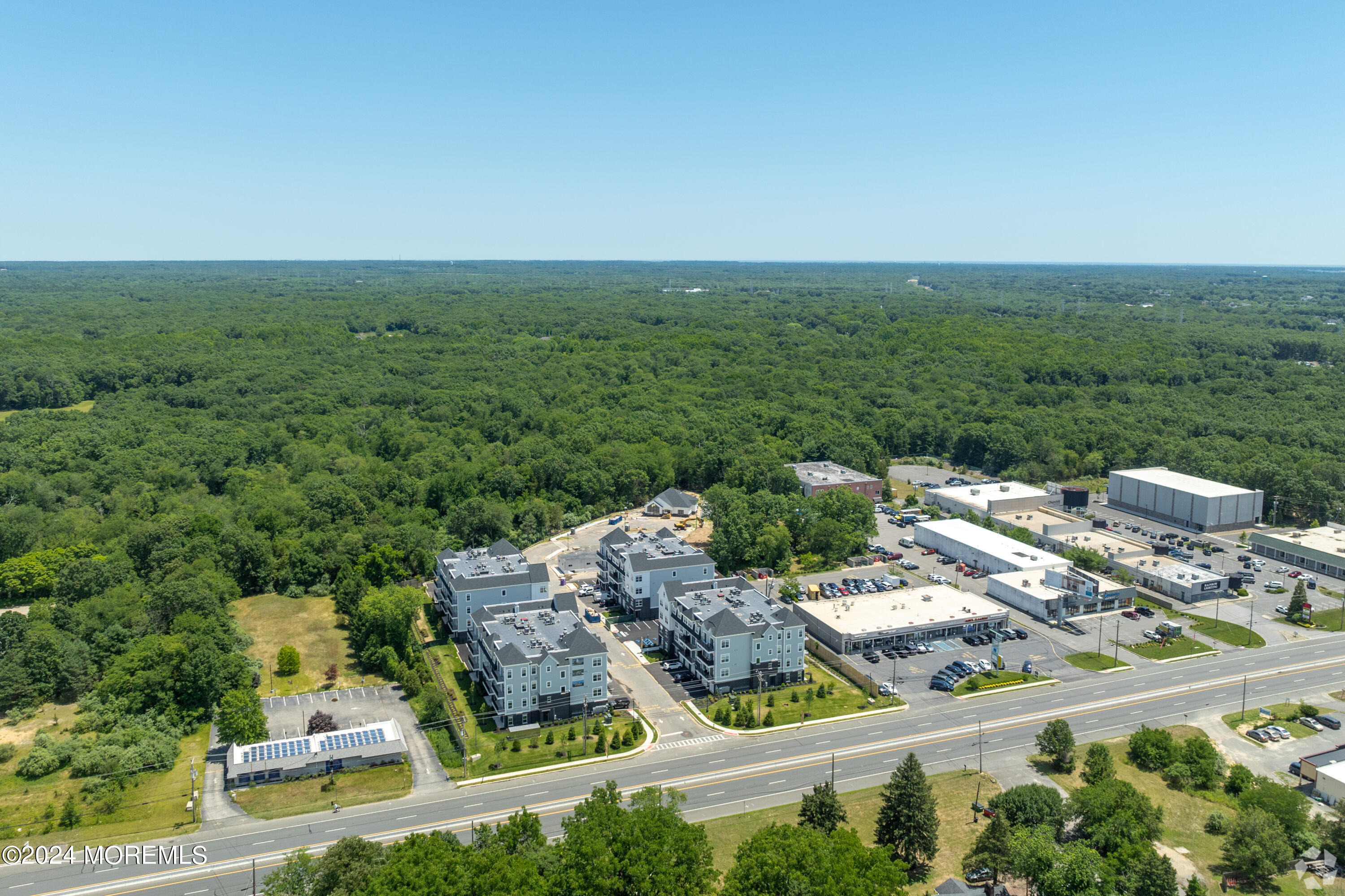 6461 Highway 9, Unit #433 Howell, NJ 07731 - Photo 21 of 29 an aerial view of a house with a garden