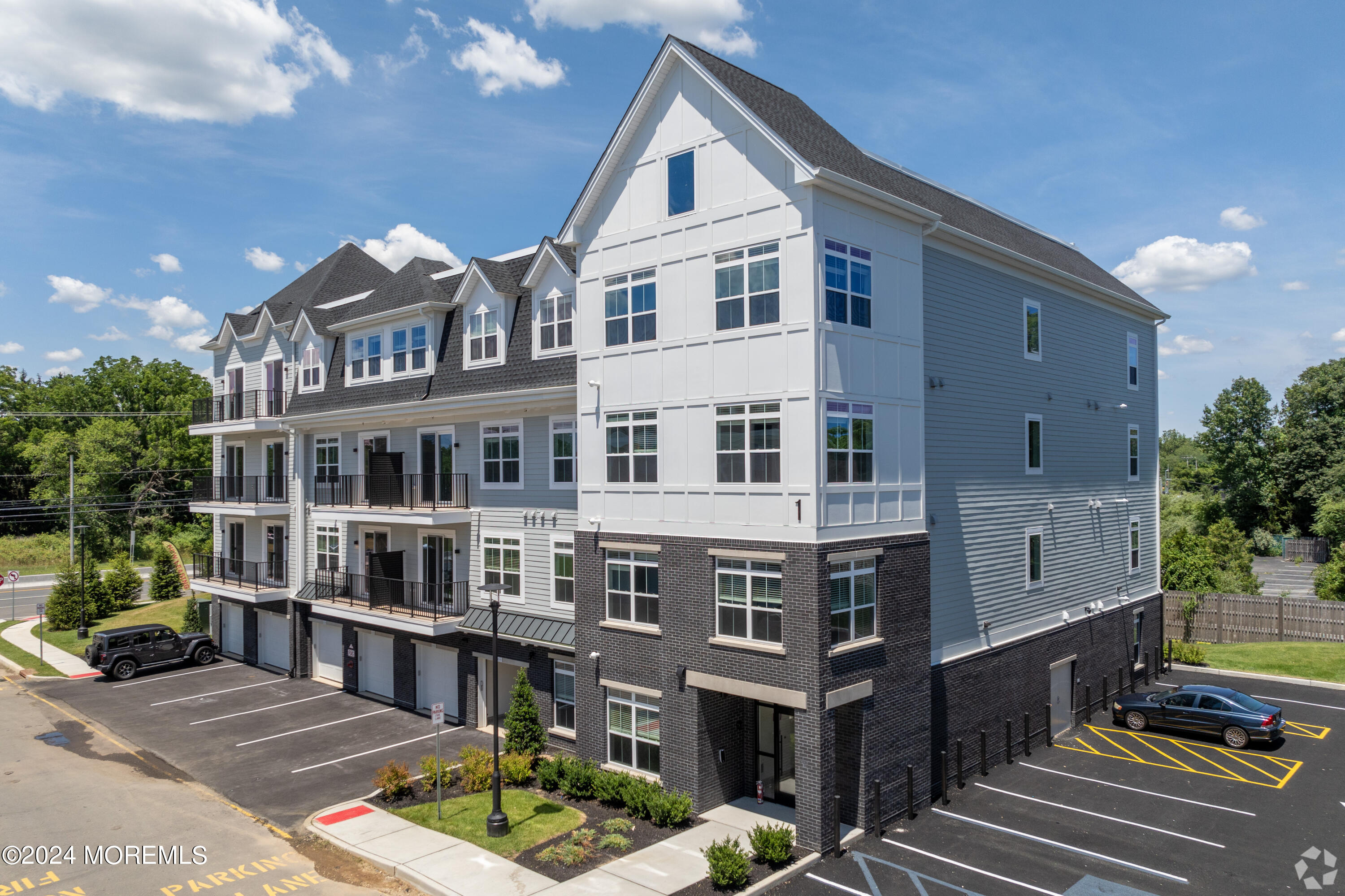 6461 Highway 9, Unit #433 Howell, NJ 07731 - Photo 26 of 29 a front view of a building with street view