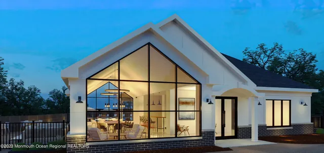 a front view of house with outdoor seating