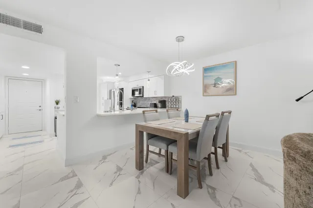 a view of a dining room with furniture