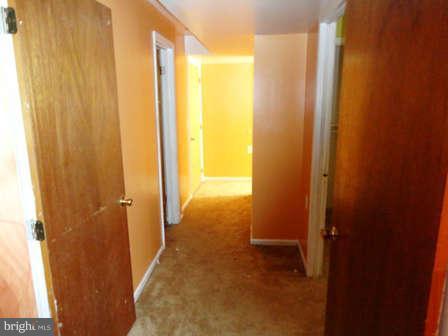 213 Biddle Road Accokeek, MD 20607 - Photo 22 of 29 Lower Level Hallway