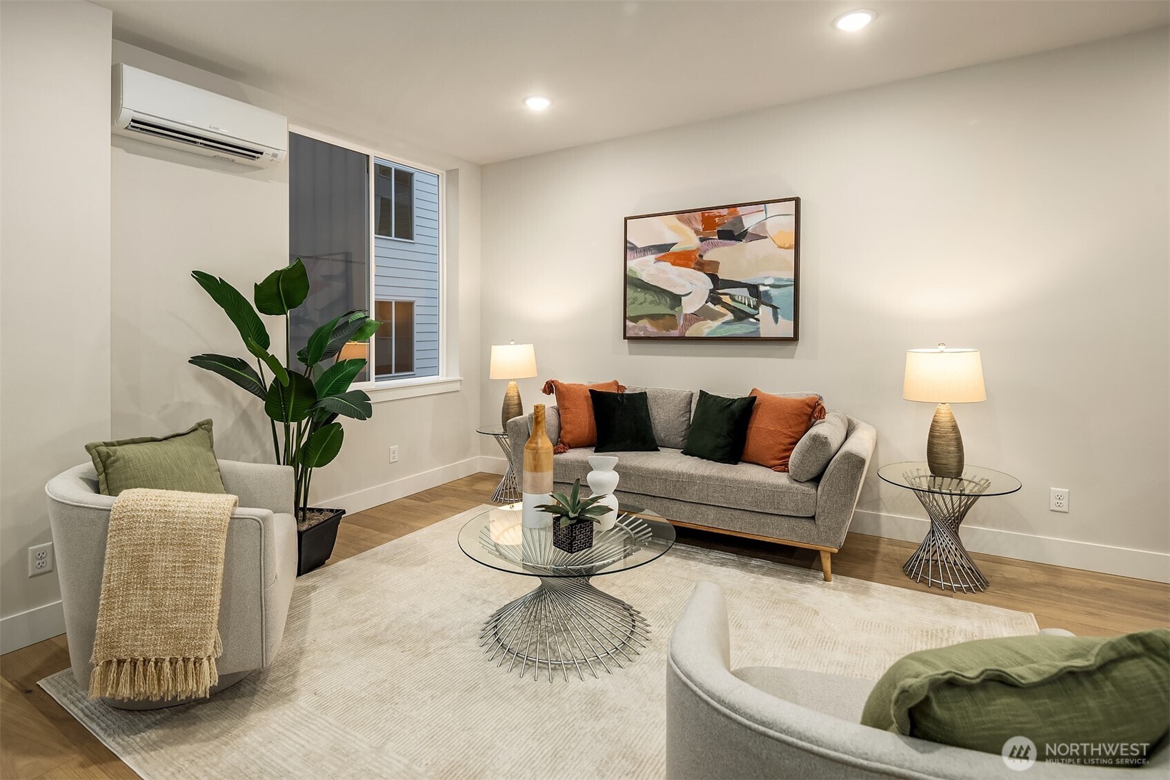 1313 14th Avenue South, Unit B Seattle, WA 98144 - Photo 11 of 30 a living room with furniture and a potted plant
