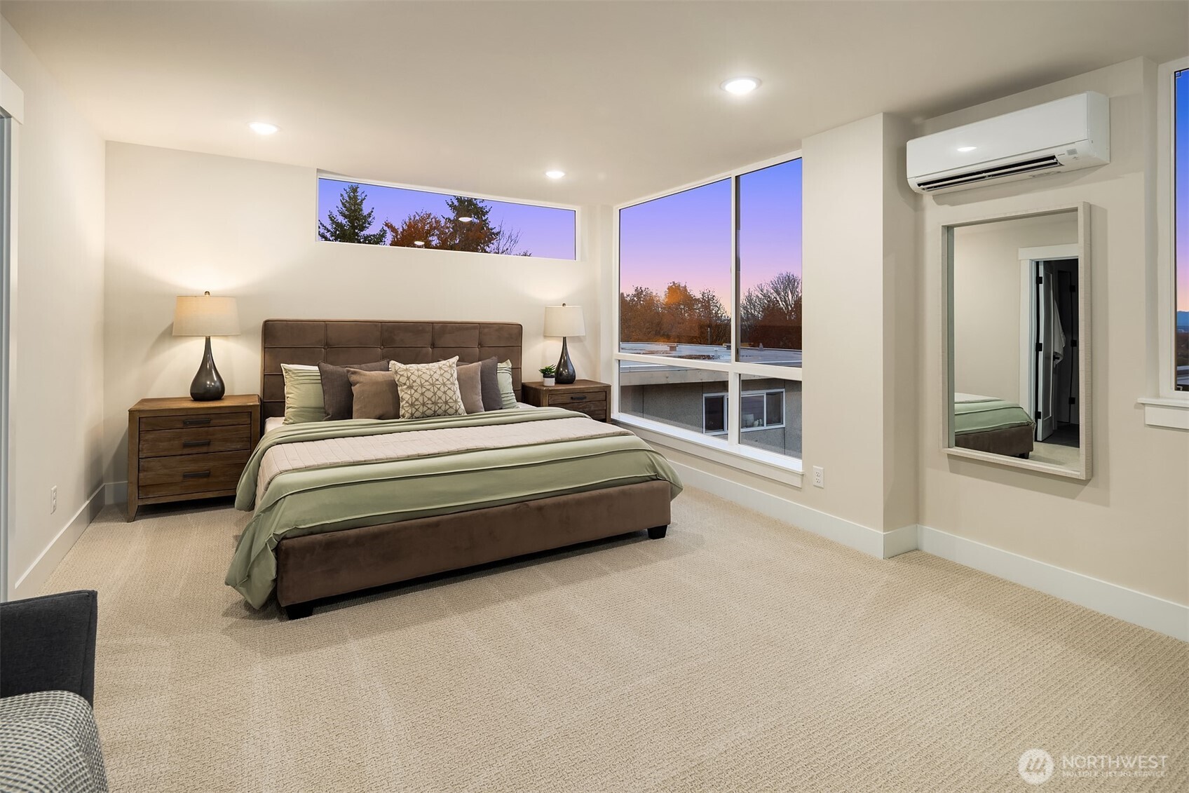 1313 14th Avenue South, Unit B Seattle, WA 98144 - Photo 13 of 30 a spacious bedroom with a bed and glass wall