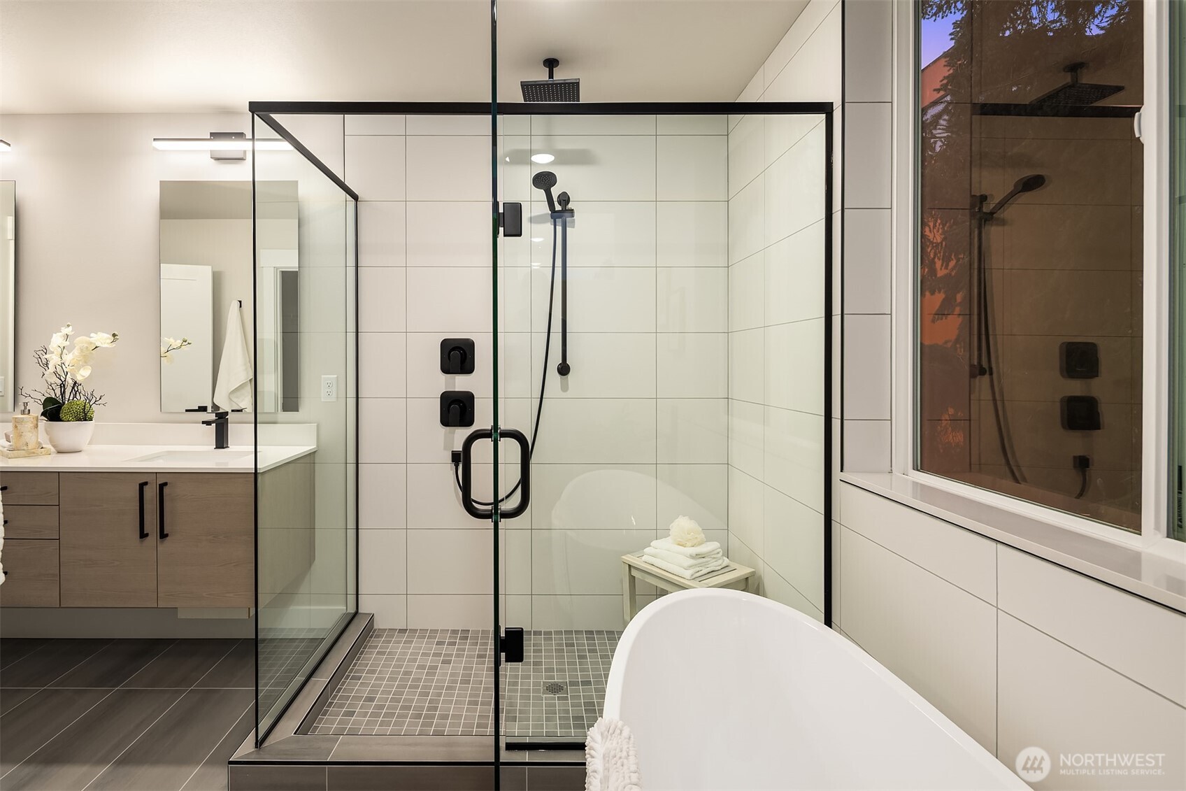 1313 14th Avenue South, Unit B Seattle, WA 98144 - Photo 19 of 30 a bathroom with a sink a toilet and shower