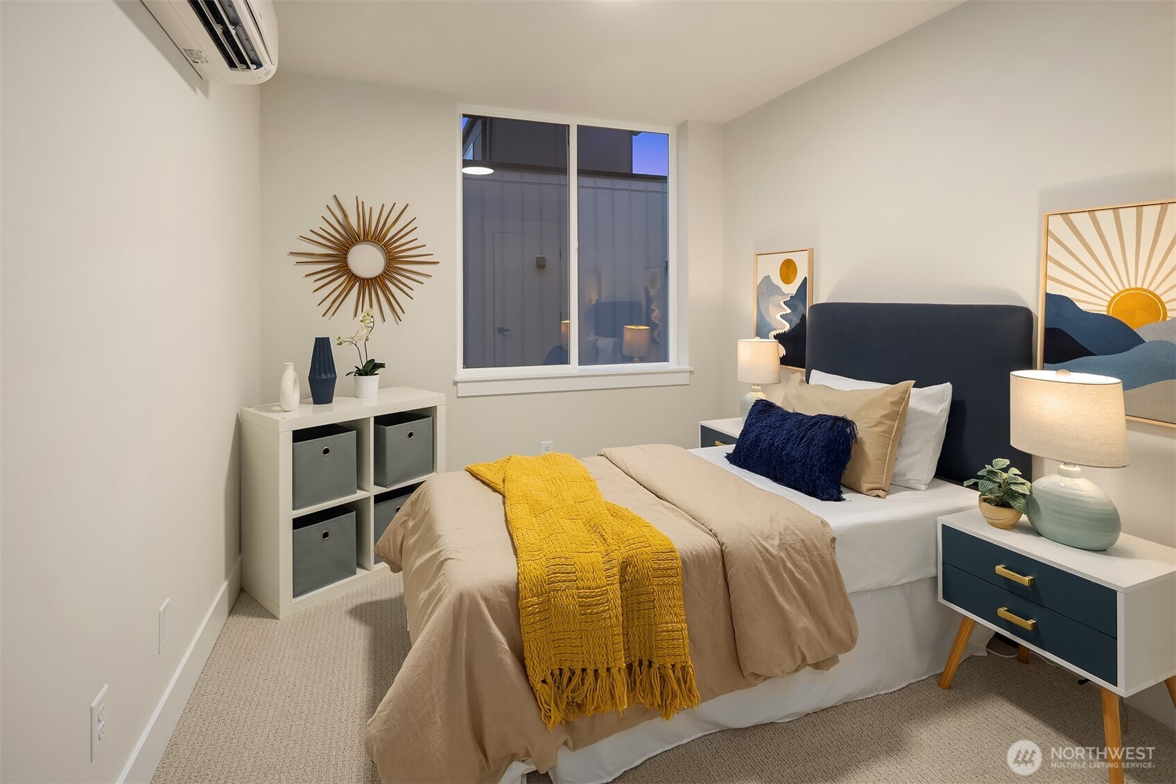 1313 14th Avenue South, Unit B Seattle, WA 98144 - Photo 21 of 30 a bedroom with a bed and a cabinets