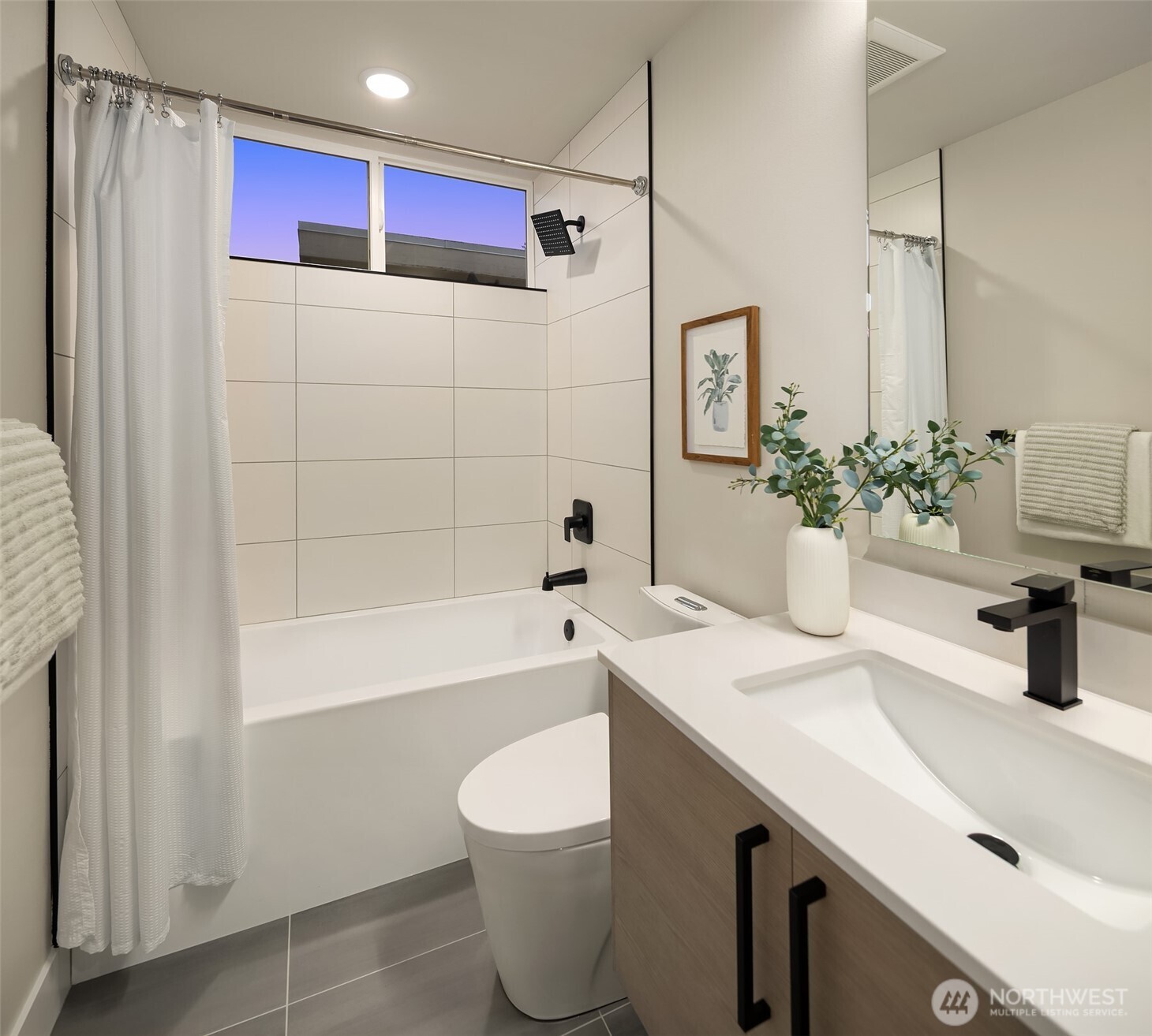 1313 14th Avenue South, Unit B Seattle, WA 98144 - Photo 24 of 30 a bathroom with a sink a toilet and shower
