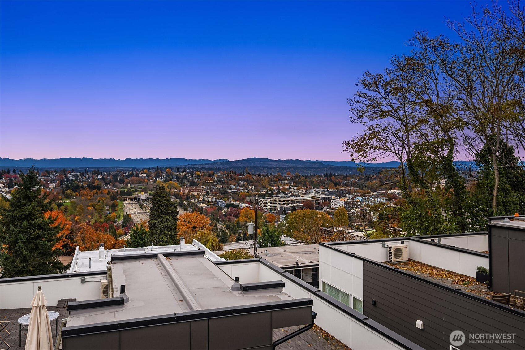 1313 14th Avenue South, Unit B Seattle, WA 98144 - Photo 26 of 30 a view of a balcony with two chairs and a table