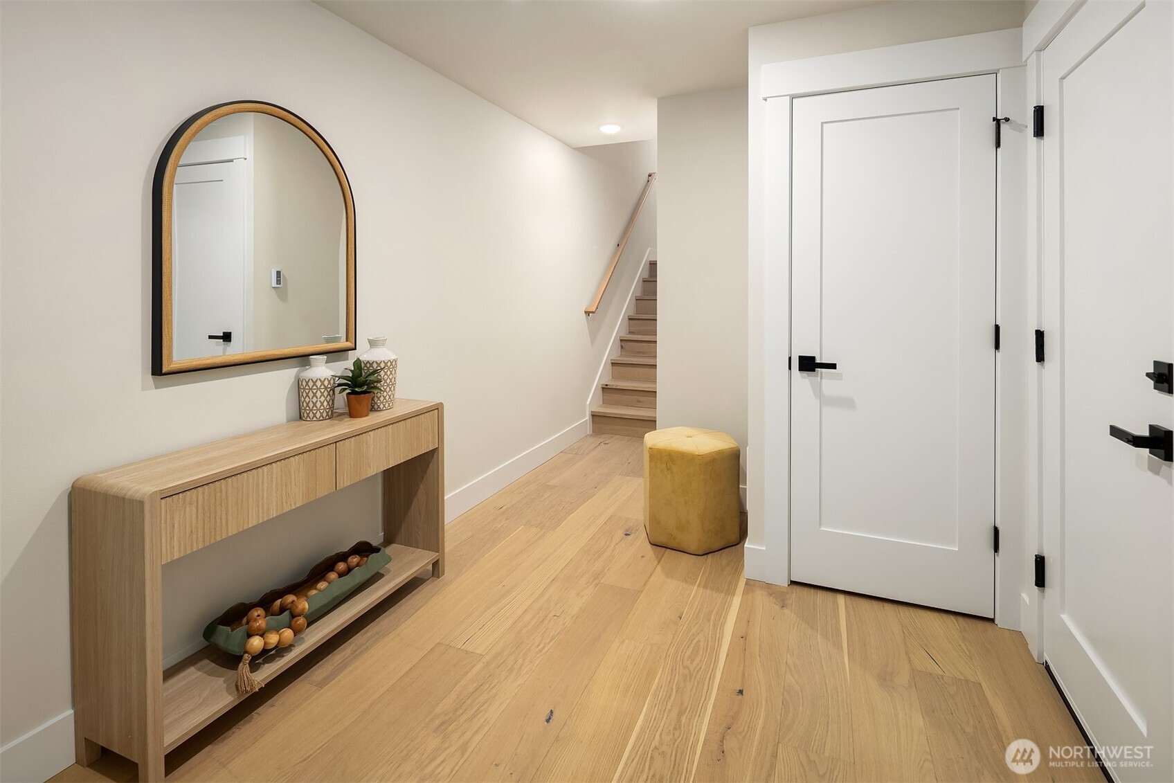 1313 14th Avenue South, Unit B Seattle, WA 98144 - Photo 3 of 30 a view of an entryway with wooden floor