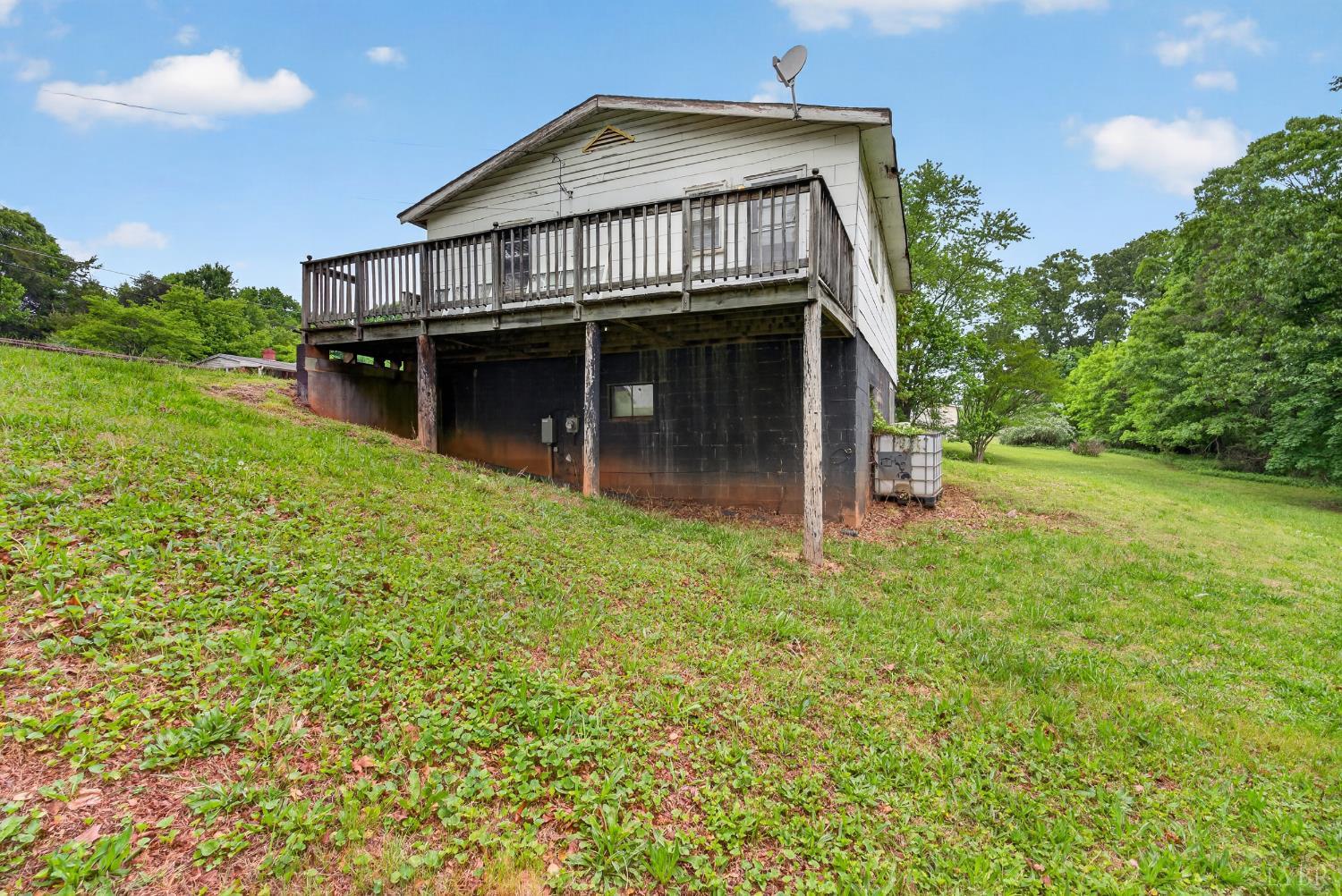 312 Cheney Lane Gretna, VA 24557 - Photo 14 of 16 a view of a house with a yard