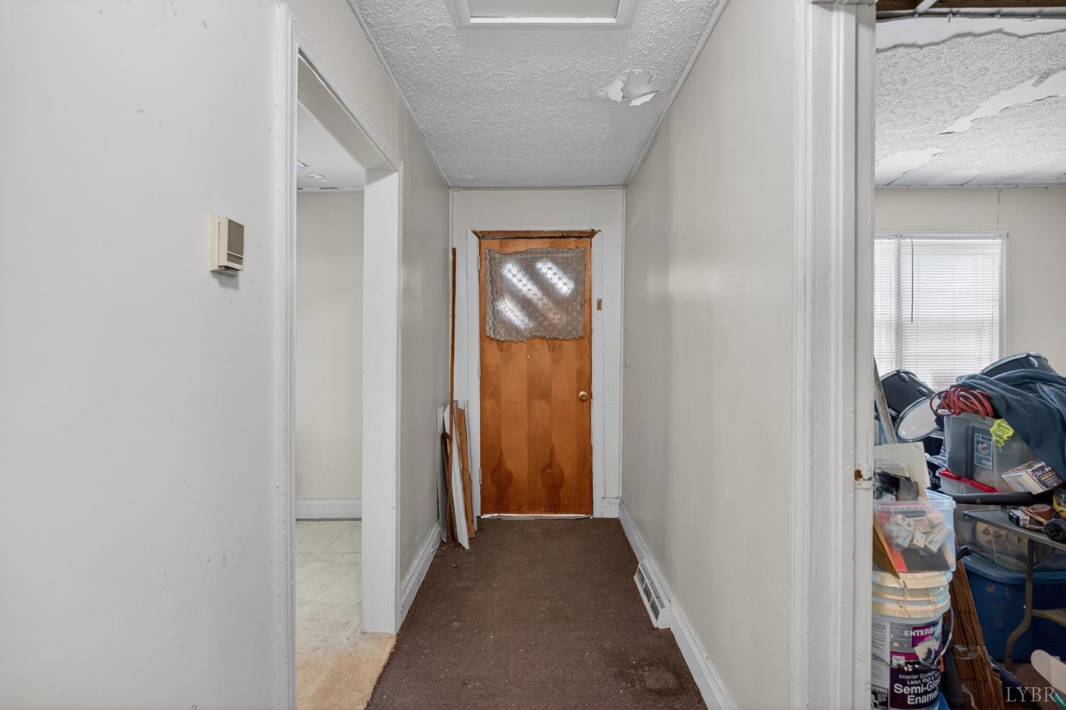 312 Cheney Lane Gretna, VA 24557 - Photo 2 of 16 a view of a hallway to a bedroom