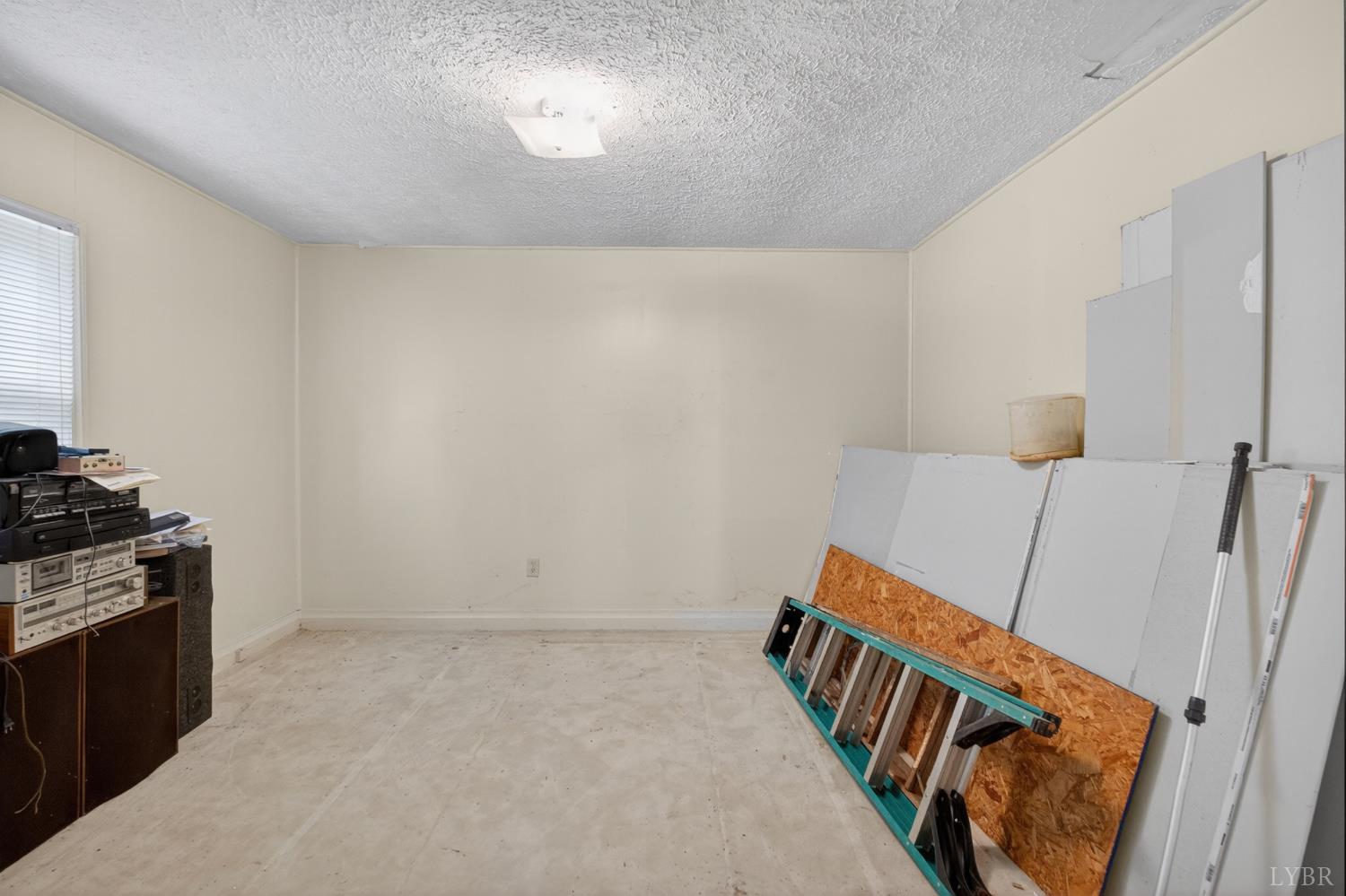 312 Cheney Lane Gretna, VA 24557 - Photo 3 of 16 a view of an empty room and wooden floor