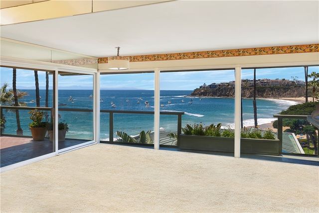 a view of an chairs and tables in the patio