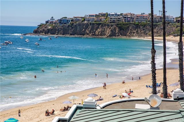 a bedroom with furniture and a fireplace