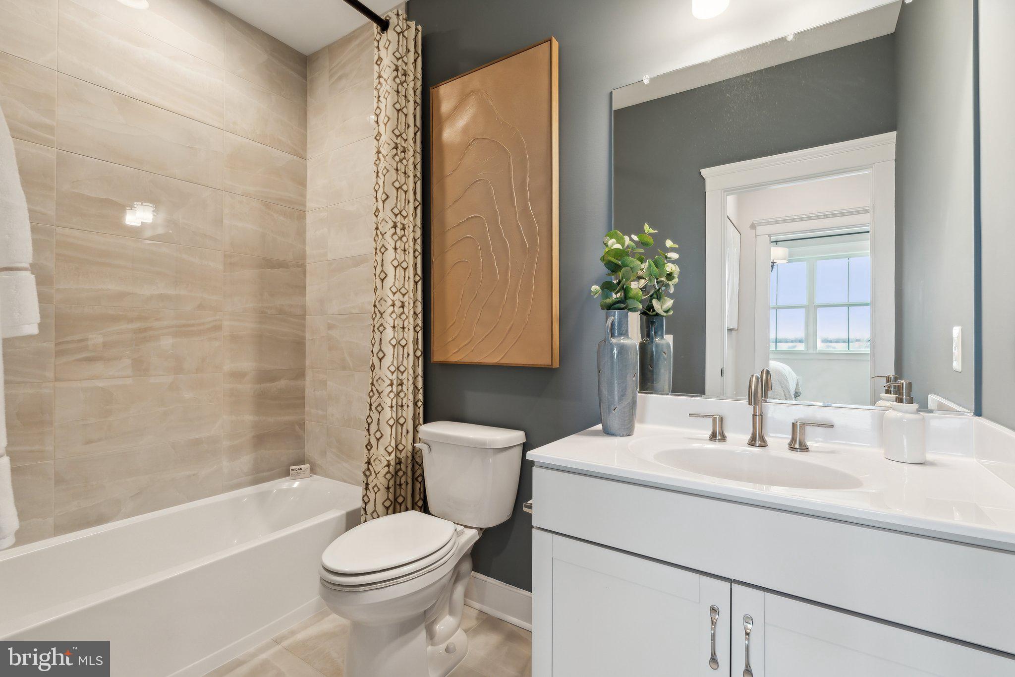 410 Granite Rdg Drive Winchester, VA 22603 - Photo 22 of 27 a bathroom with a sink toilet and shower