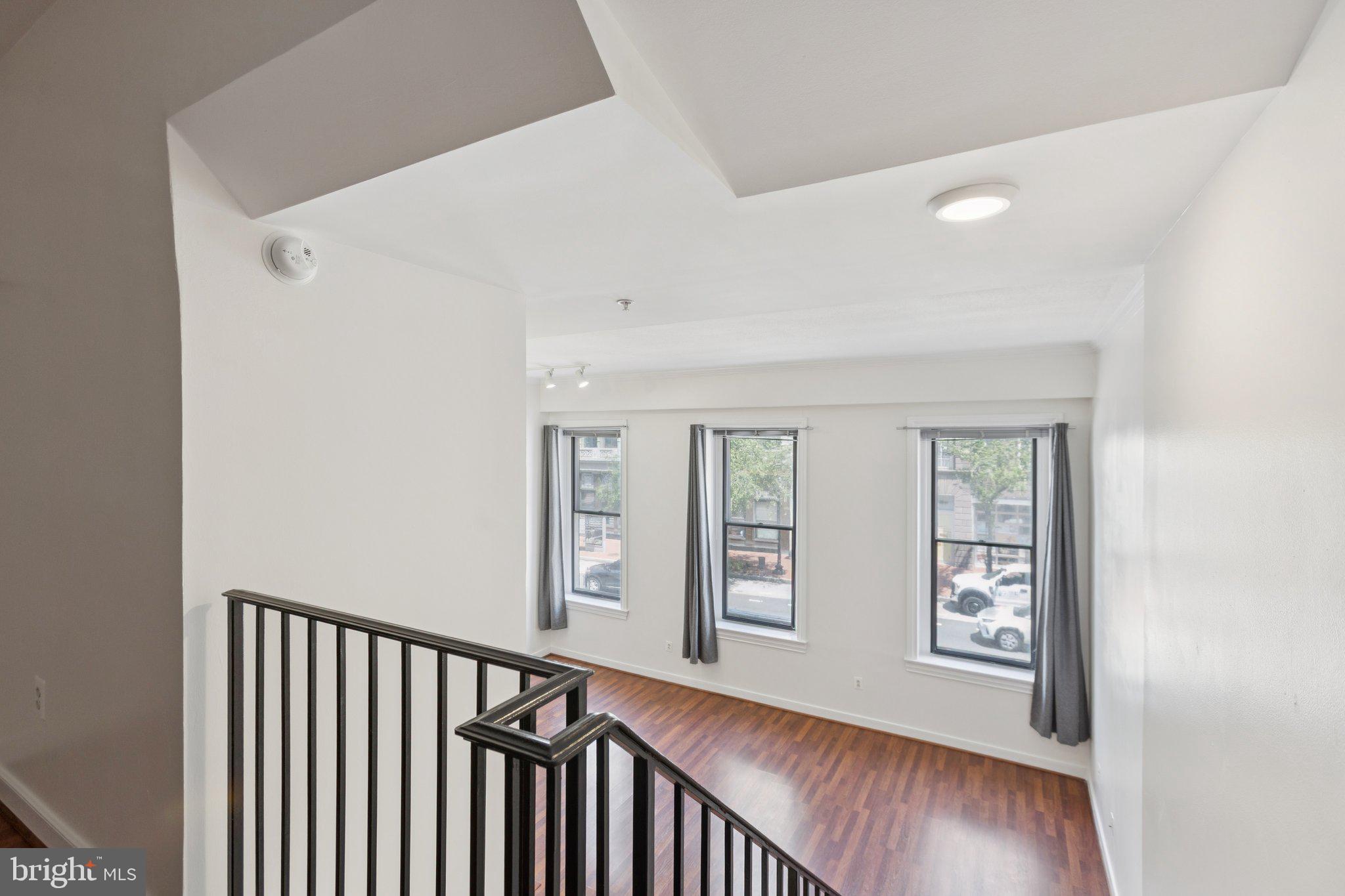 616 E Street Northwest, Unit 217 Washington, DC 20004 - Photo 17 of 73 a view of an entryway with wooden floor