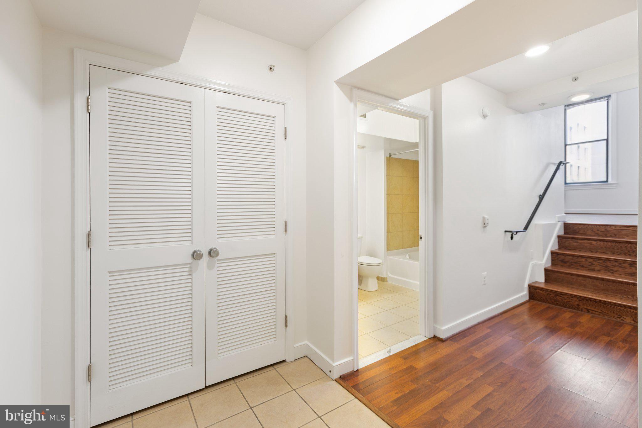 616 E Street Northwest, Unit 217 Washington, DC 20004 - Photo 5 of 73 a view of an entryway with wooden floor