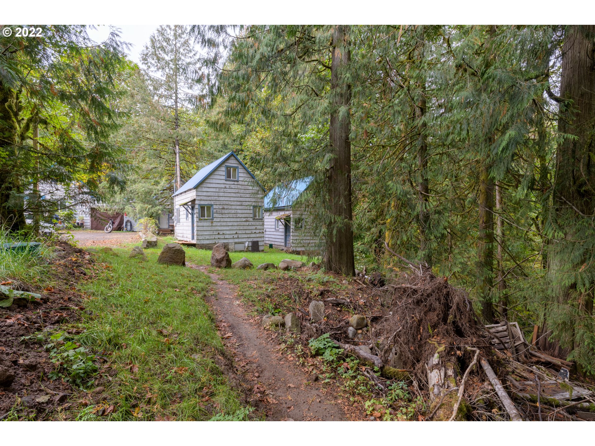 69947 East E Highway, Unit 5 Rhododendron, OR 97049 - Photo 12 of 31 a house view with a backyard space
